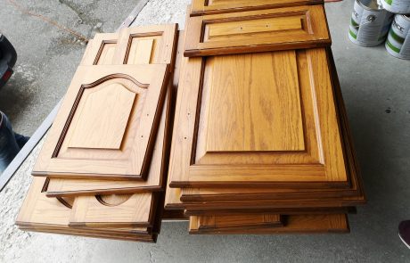 disassembled kitchen cabinet doors stacked. Original kitchen cabinets in need of a makeover, located in Erin, Toronto