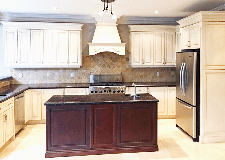 Original two-toned kitchen cabinets in North York, Toronto, before the transformative spraying project