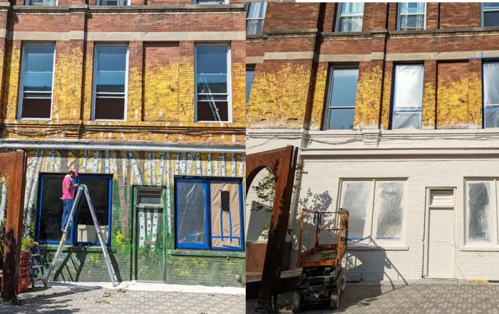 Before and after images of a cafe exterior in downtown Toronto, located at the intersection of Queen Street and Bathurst. The before photo shows the original art work on the brick facade, while the after photo depicts the same facade after being sprayed with white paint.