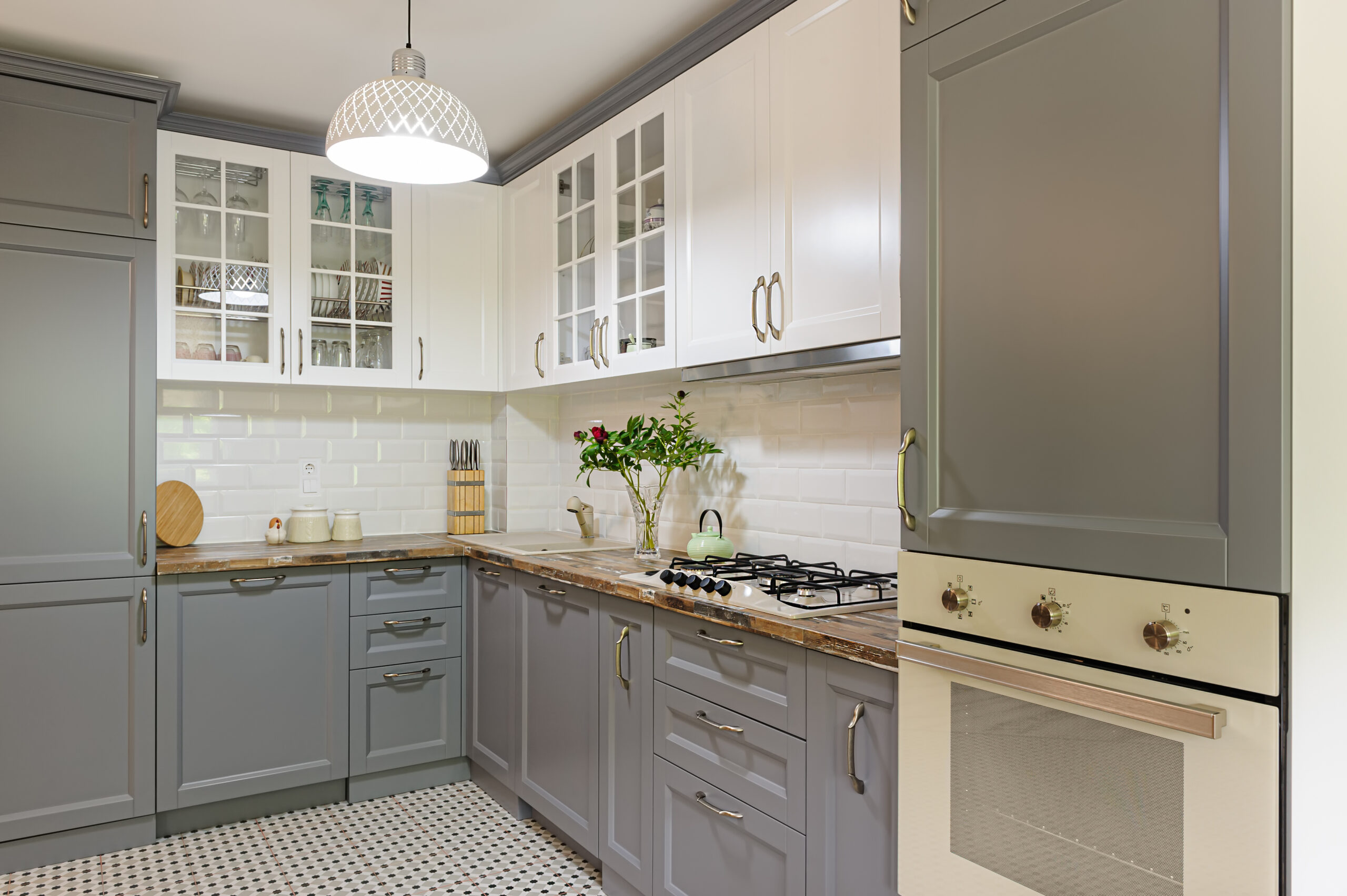 Monochromatic kitchen cabinet for a sleek and timeless culinary space.