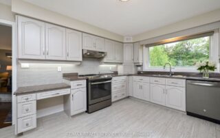 Elevate your kitchen in Toronto with our kitchen cabinet painting service featuring Cloud White OC-130