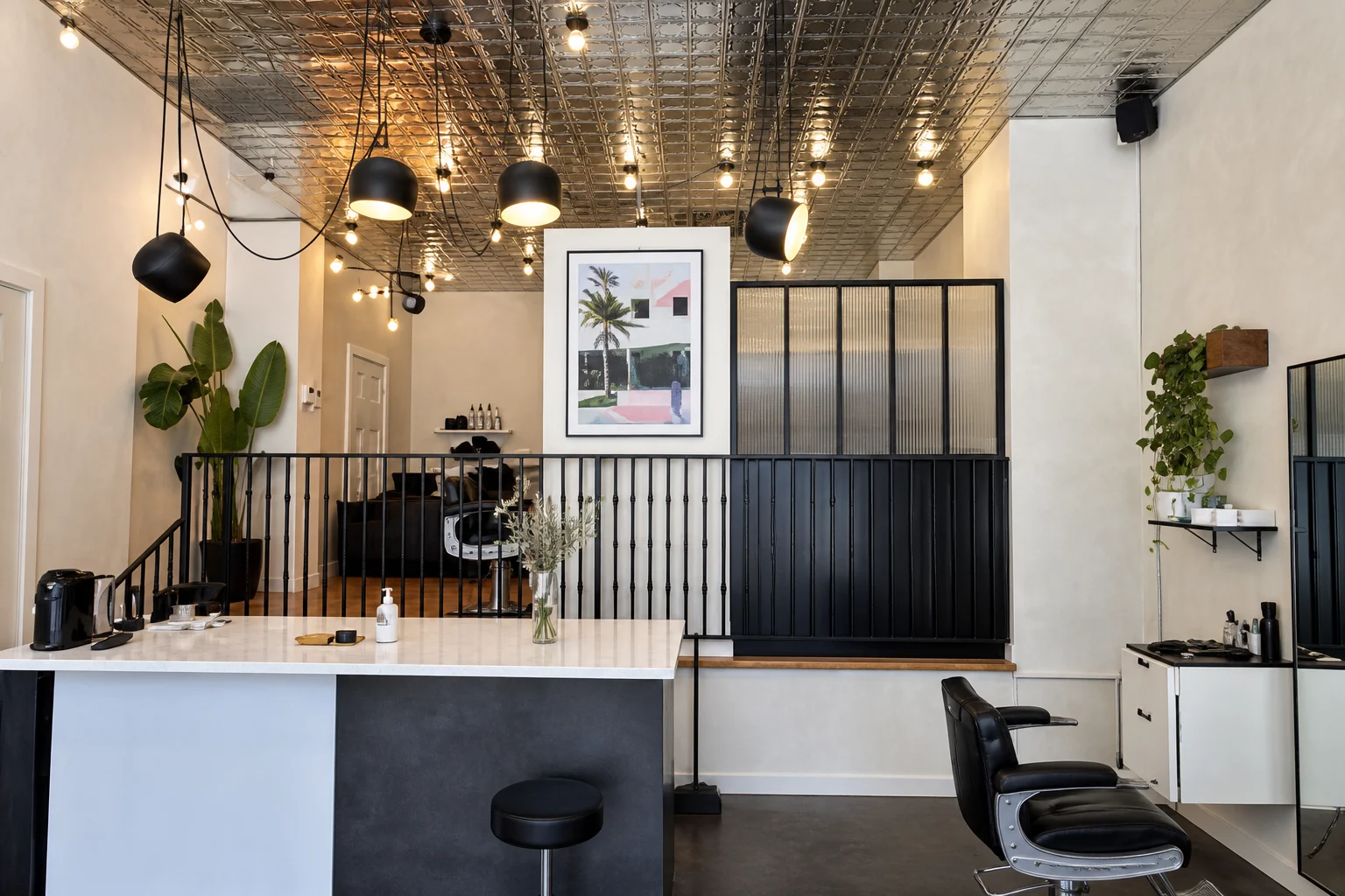 Commercial Limewash Toronto – Barbershop Reception Downtown Toronto barbershop reception with soft neutral limewash walls
