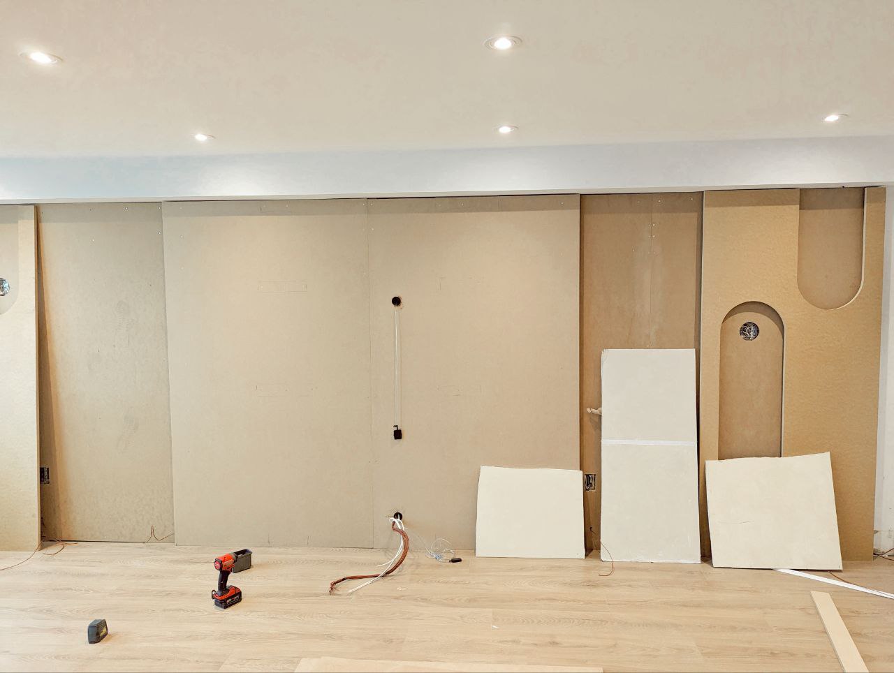 Unfinished wood wall ready for transformation.