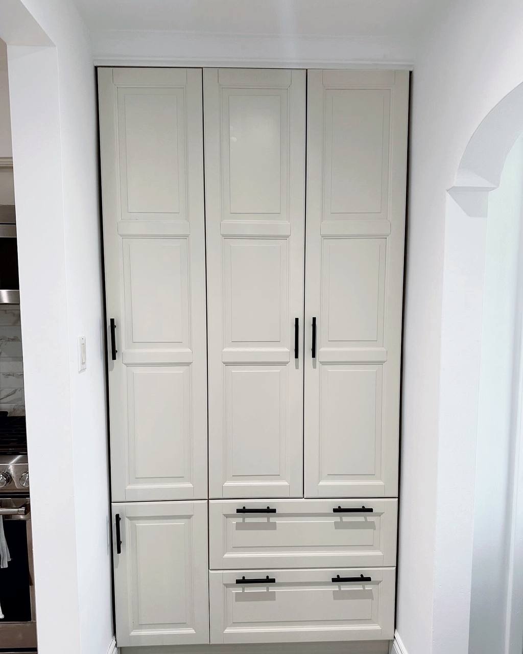"After image of MDF pantry cabinet painted with Benjamin Moore Misty Air OC-44, creating a refreshed and inviting atmosphere in the George Town kitchen space