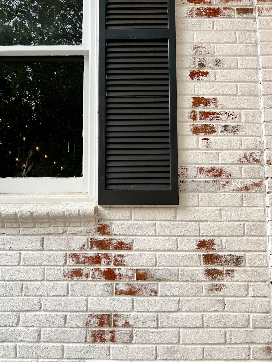 Close up of limewash on exterior brick