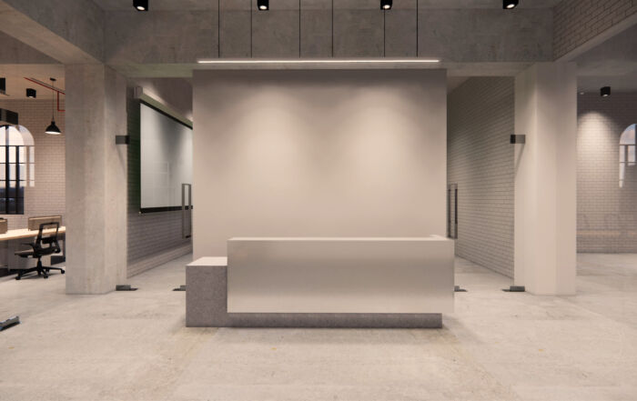 2025 office design trend featuring a microcement reception desk in a modern office interior.