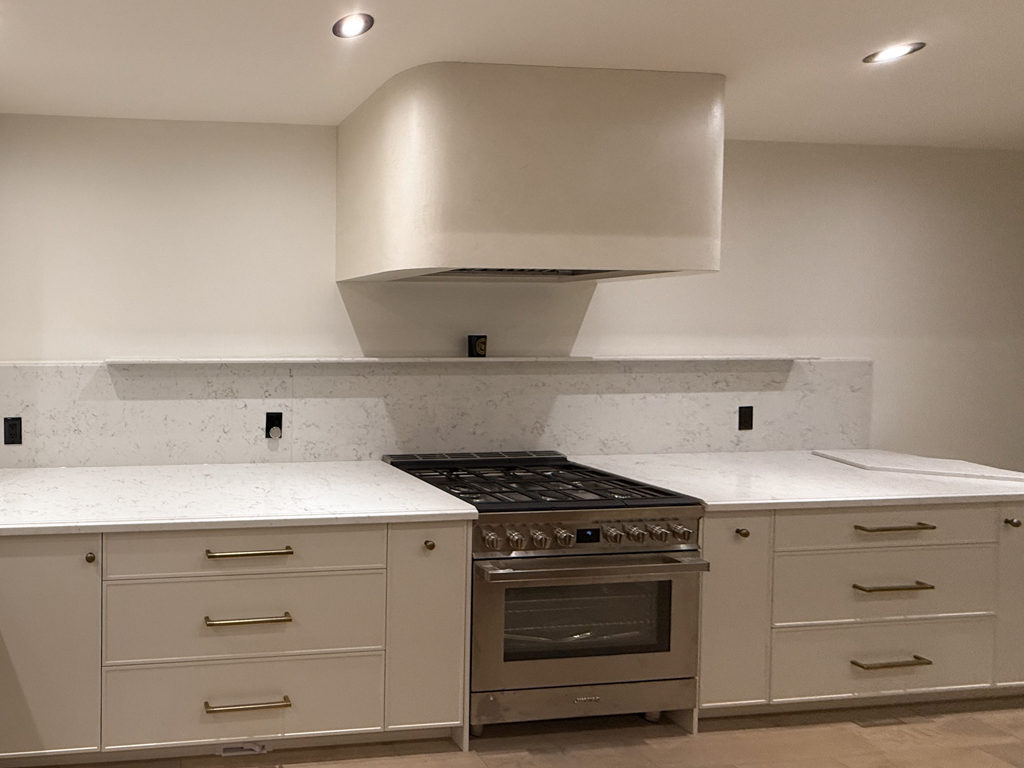 venetian-plaster-textured-finish-range-hood-kleingburg-toronto-2 Range hood finishes: venetian plaster finish for free standing range hood, barnished soft for a soft sheen, sealed for washability, marmorino finish in off-white colour, Sherwin Williams Alabaster colour to match cabinets, venetian plaster installation project in palgrave, toronto