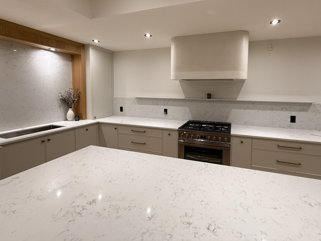 venetian-plaster-textured-finish-range-hood-kleingburg-toronto-4 Range hood finishes: venetian plaster finish for free standing range hood, barnished soft for a soft sheen, sealed for washability, marmorino finish in off-white colour, Sherwin Williams Alabaster colour to match cabinets, venetian plaster installation project in palgrave, toronto