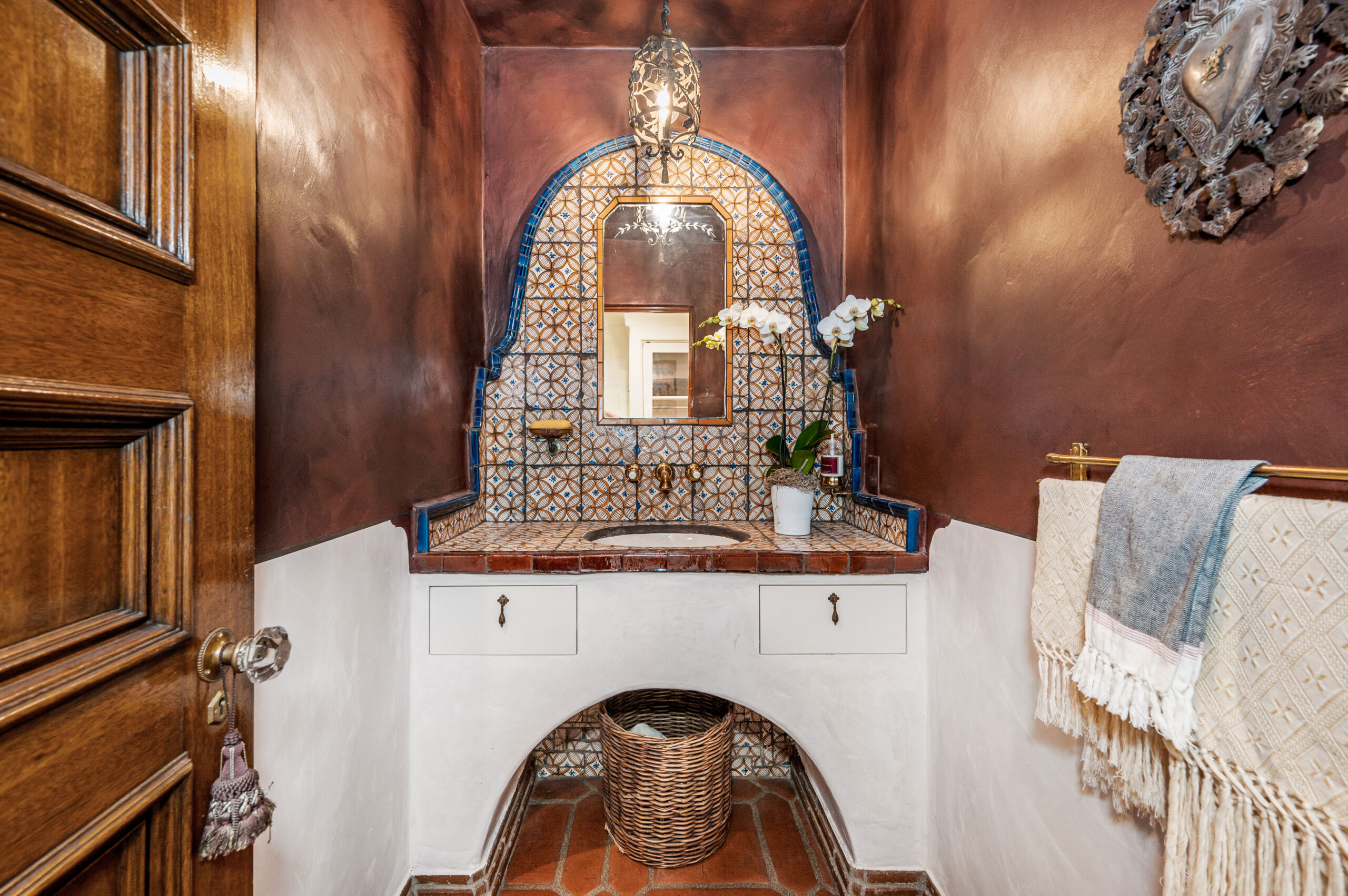 Copper Tadelakt Plaster Powder Room Walls and Ceiling Powder room with copper-toned Tadelakt plaster on walls and ceiling.