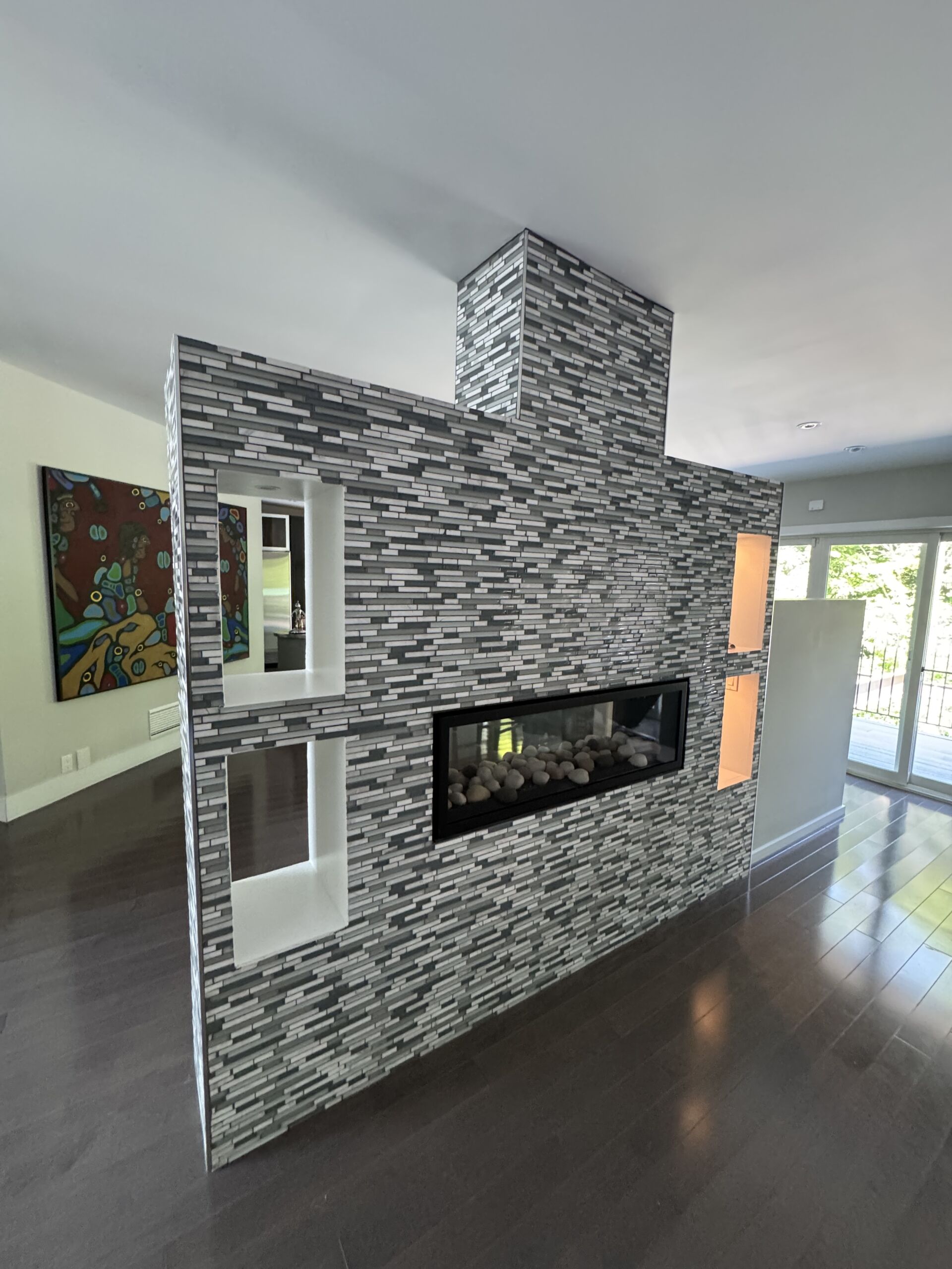 fireplace makeover venetian plaster with metallic finish in north york toronto1 Two-sided tiled fireplace before being refinished in Venetian plaster