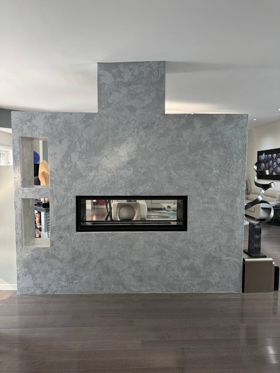fireplace makeover venetian plaster with metallic finish in north york toronto15 Venetian plaster on fireplace with metallic dual-tone finish in Toronto living room