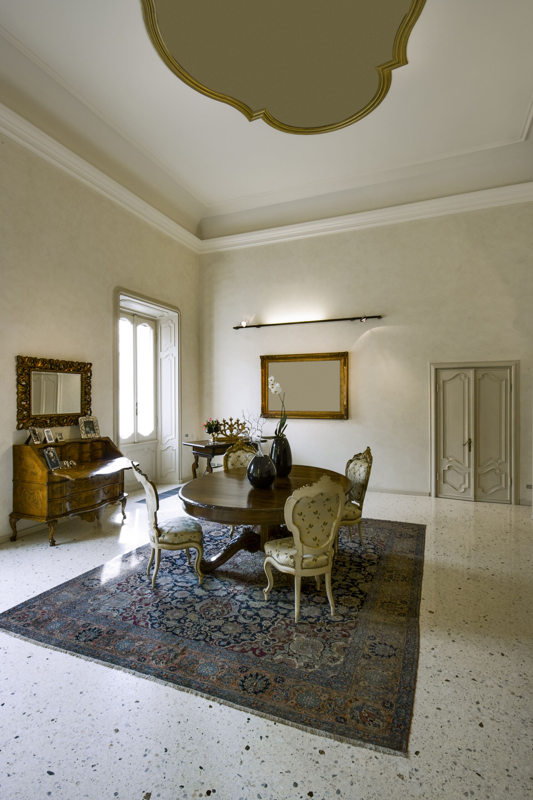 Limewash Painting in High-Ceiling Dining Room, Jacksonville Limewash painting on interior dining room walls with high ceiling, soft natural tones, Jacksonville Florida