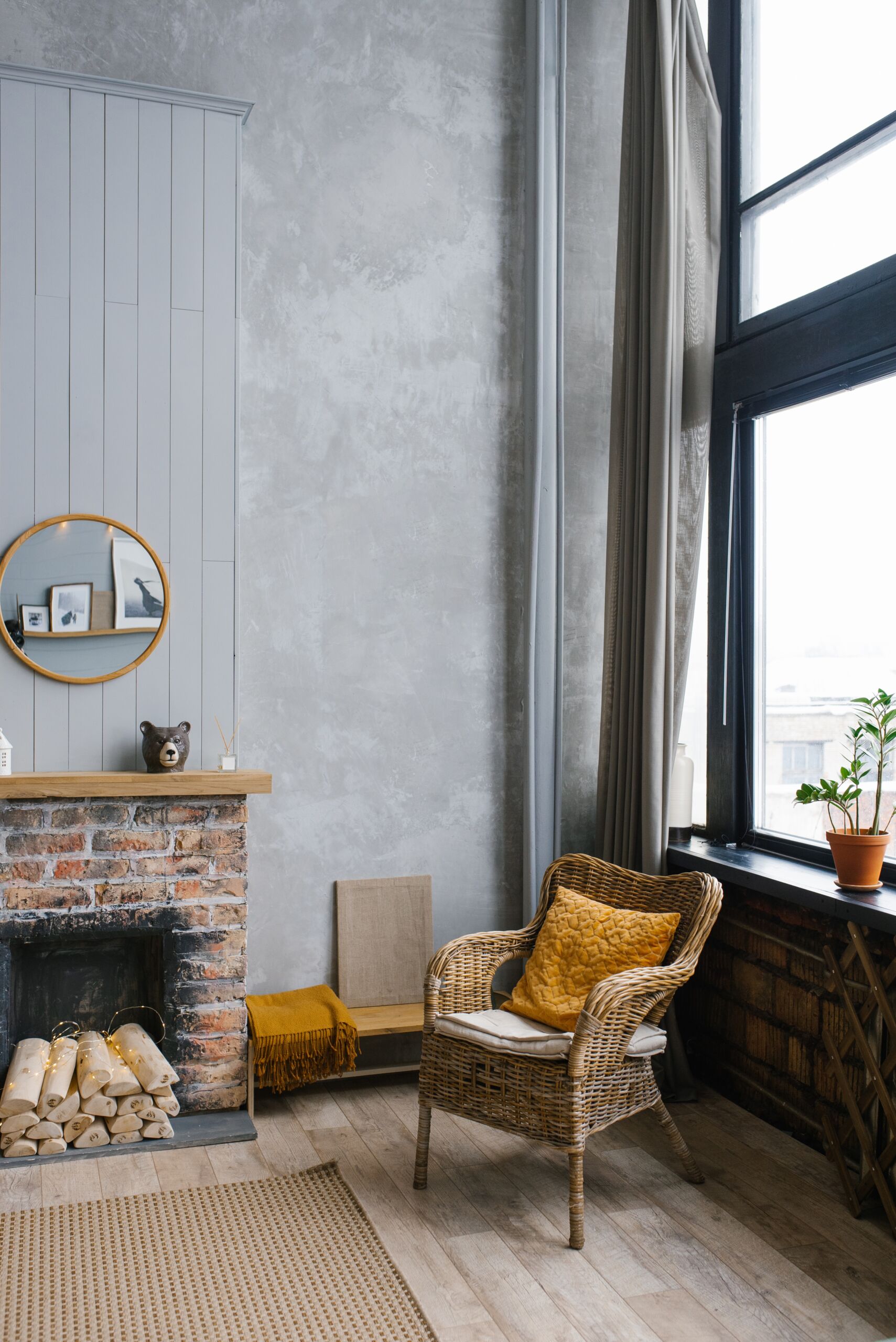 Modern interior with decorative fireplace wall finished in limewash in Toronto loft.