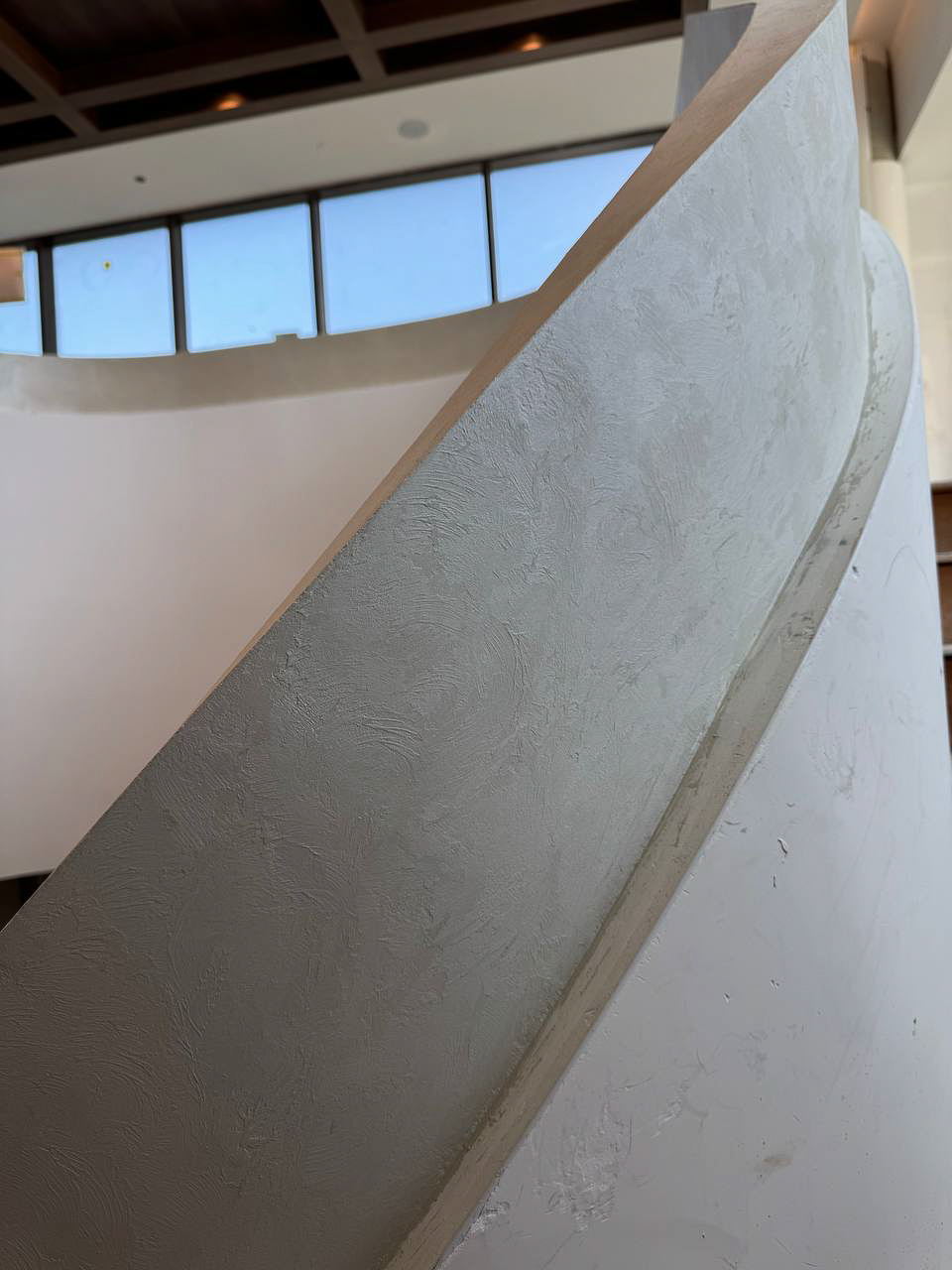 velvet-modern-venetian-plaster-finish-for-staircase-handrail-for-royal-bayview-residences-by–tridel-in-thornhill9 Close-up of final Venetian plaster finish with velvet texture in off-white and grey tones at Royal Bayview Thornhill