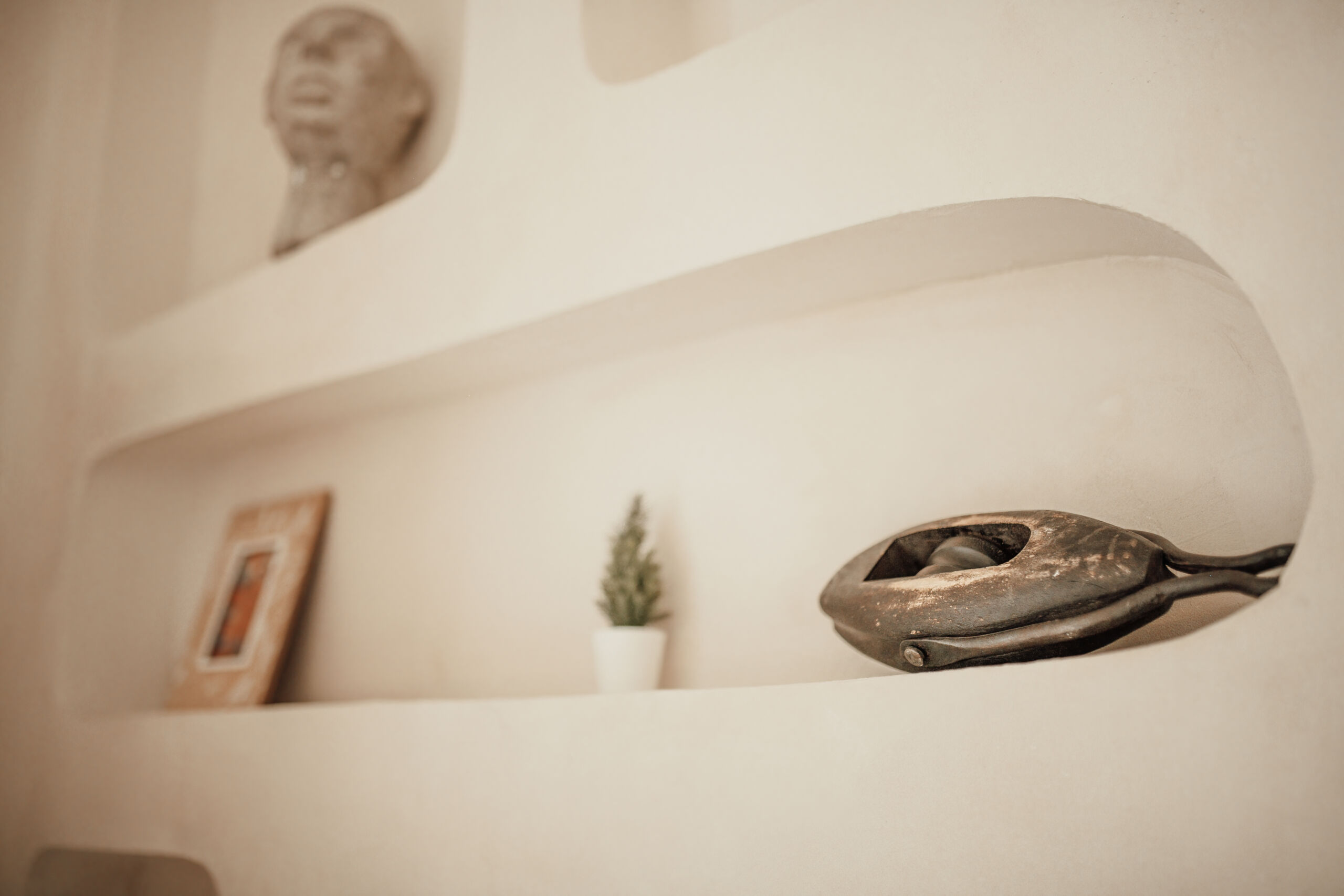 Luxury interior eco style living room elements of traditional balinese design at natural lighting Close-up of a soft white plastered niche in a Florida home