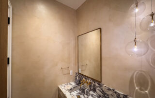 Elegant Beige Limewash Powder Room in Mississauga