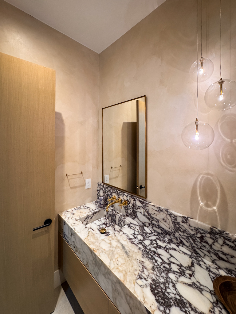 Elegant Beige Limewash Powder Room in Mississauga