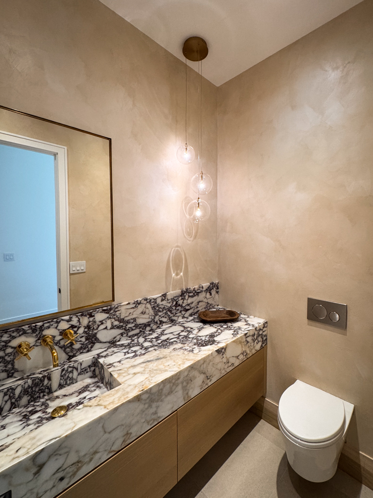 Elegant Beige Limewash Powder Room in Mississauga