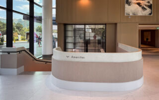 Staircase in a Tridel lobby finished with wam gray Modern Velvet Venetian Plaster, showcasing a soft, smooth texture