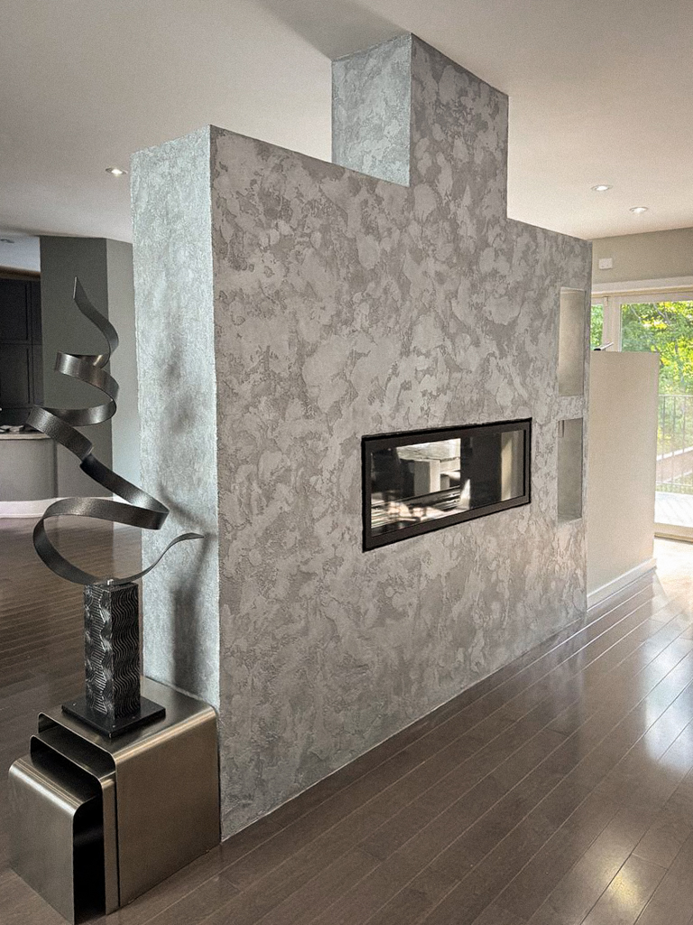 metallic-venetian-plaster-over-fireplace-wall-north york-toronto-6 Detail shot showing the layers and shimmer of the silver metallic Venetian plaster and Marmorino finish.