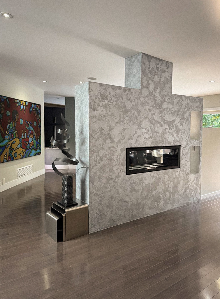 Detail of the silver metallic paint and mica being applied to the final coat of the metallic Venetian plaster.