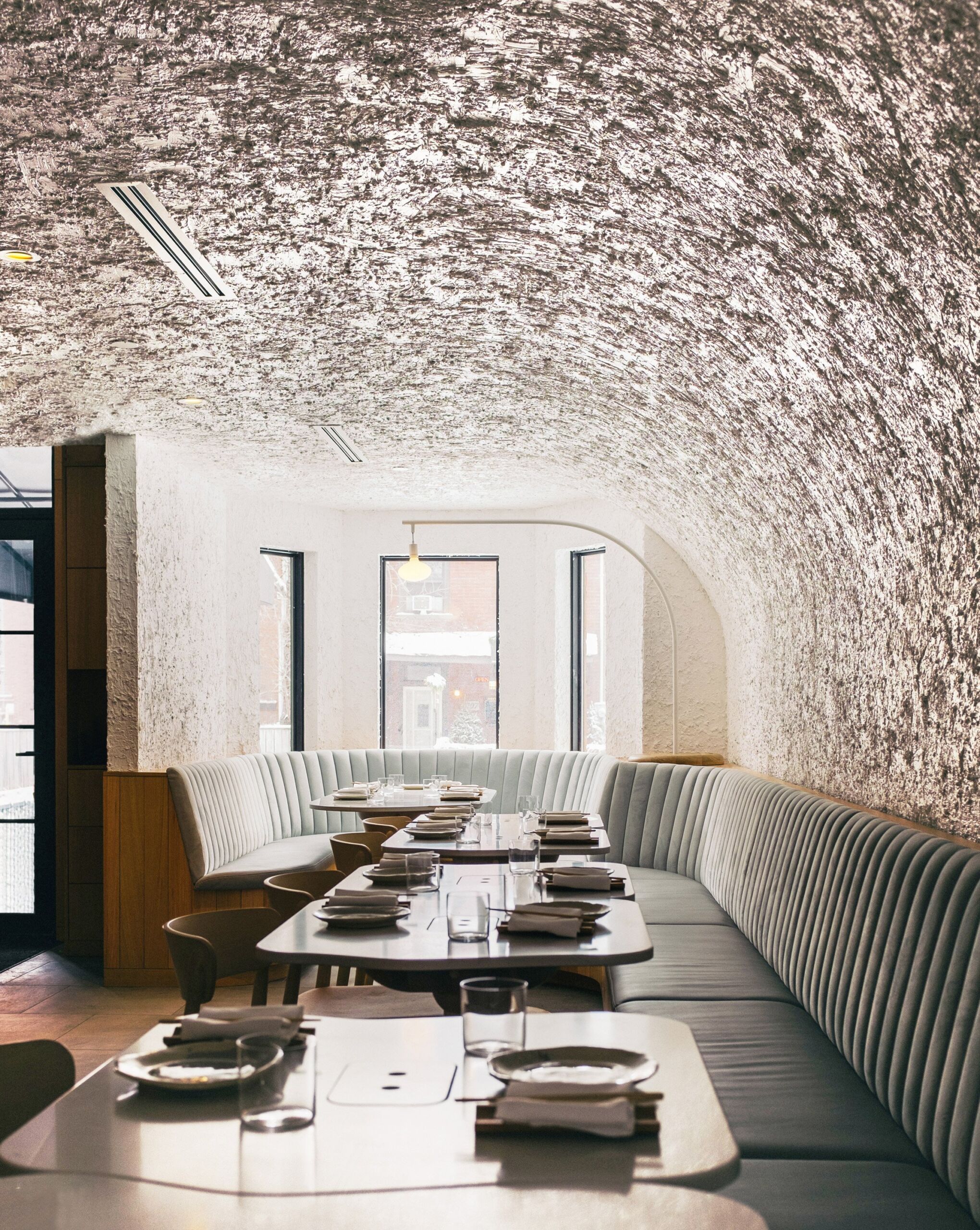 sara-restaurant-odami-toronto_dezeen_2364_col_8 Plaster finish for walls and ceilings at Sara restaurant: the ceiling and arched walls with a mixture of plaster and recycled materials created through a series of experiments.