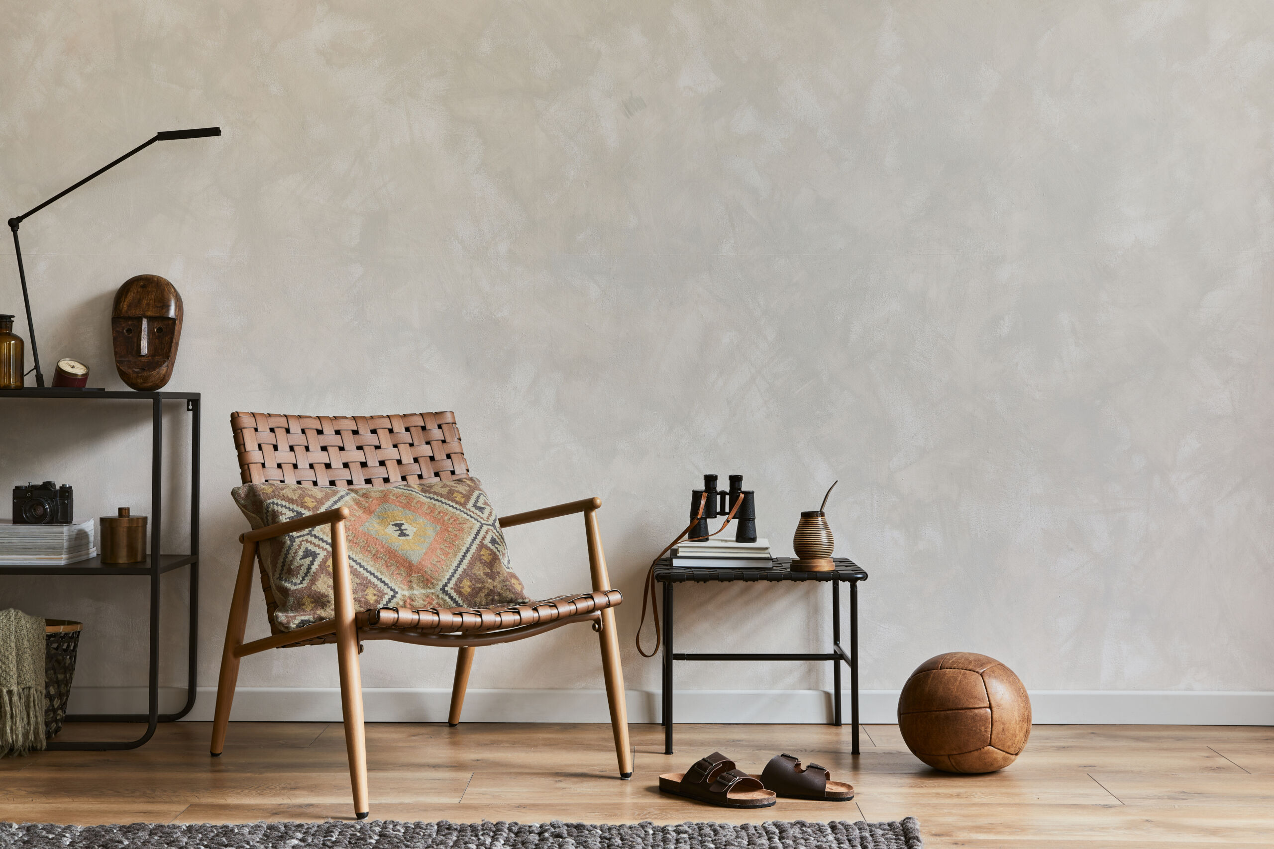 Bone Color Plastered Walls in Elegant Masculine Living Room Interior Stylish, elegant masculine living room featuring plastered walls in a warm bone color, dark furniture, and minimalist decor.