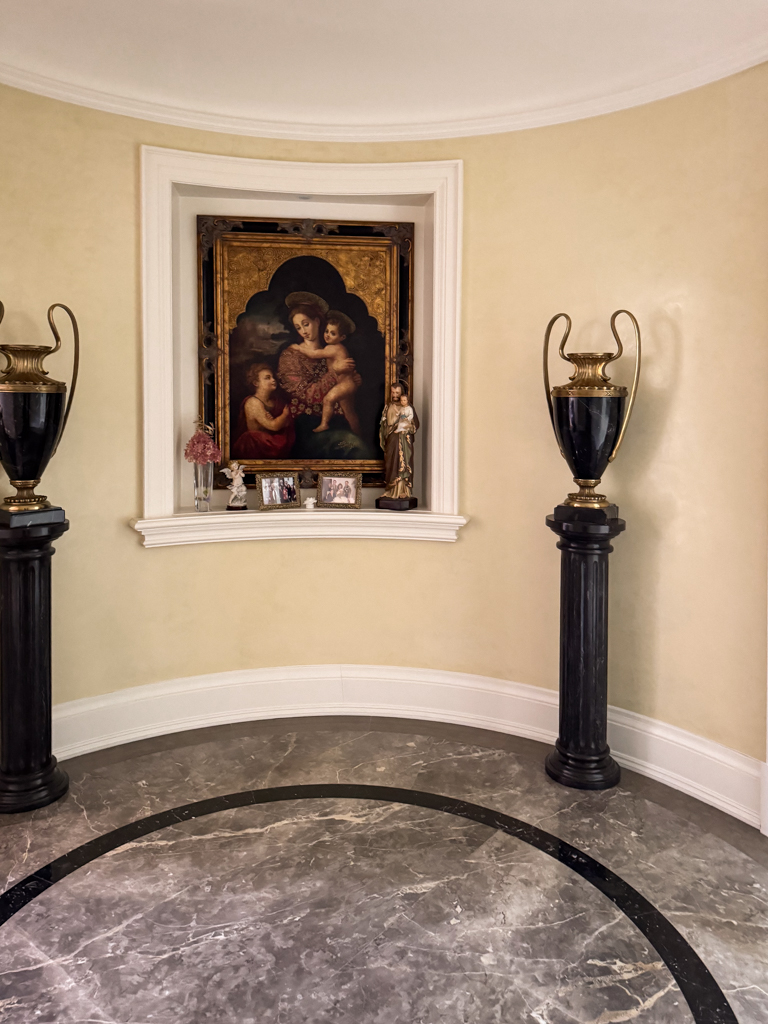 Seamless, high-gloss Venetian plaster finish (Grasello) applied to foyer and hallway walls of a luxury Richmond Hill home.