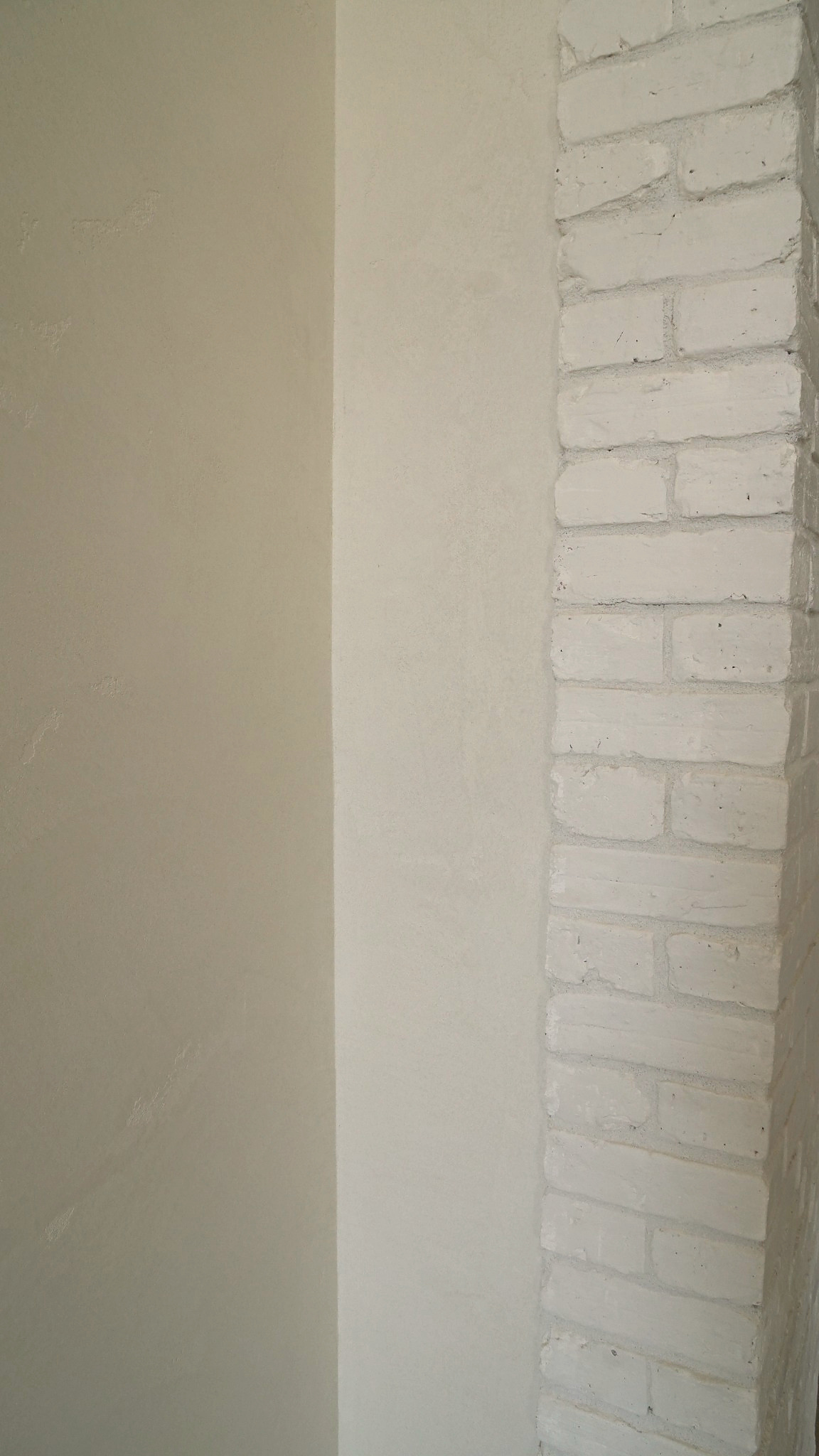 white-venetian-plaster-walls-kleinburg-house5 Custom Venetian plaster hallway with arched openings, oak details and herringbone flooring in a luxury Kleinburg home
