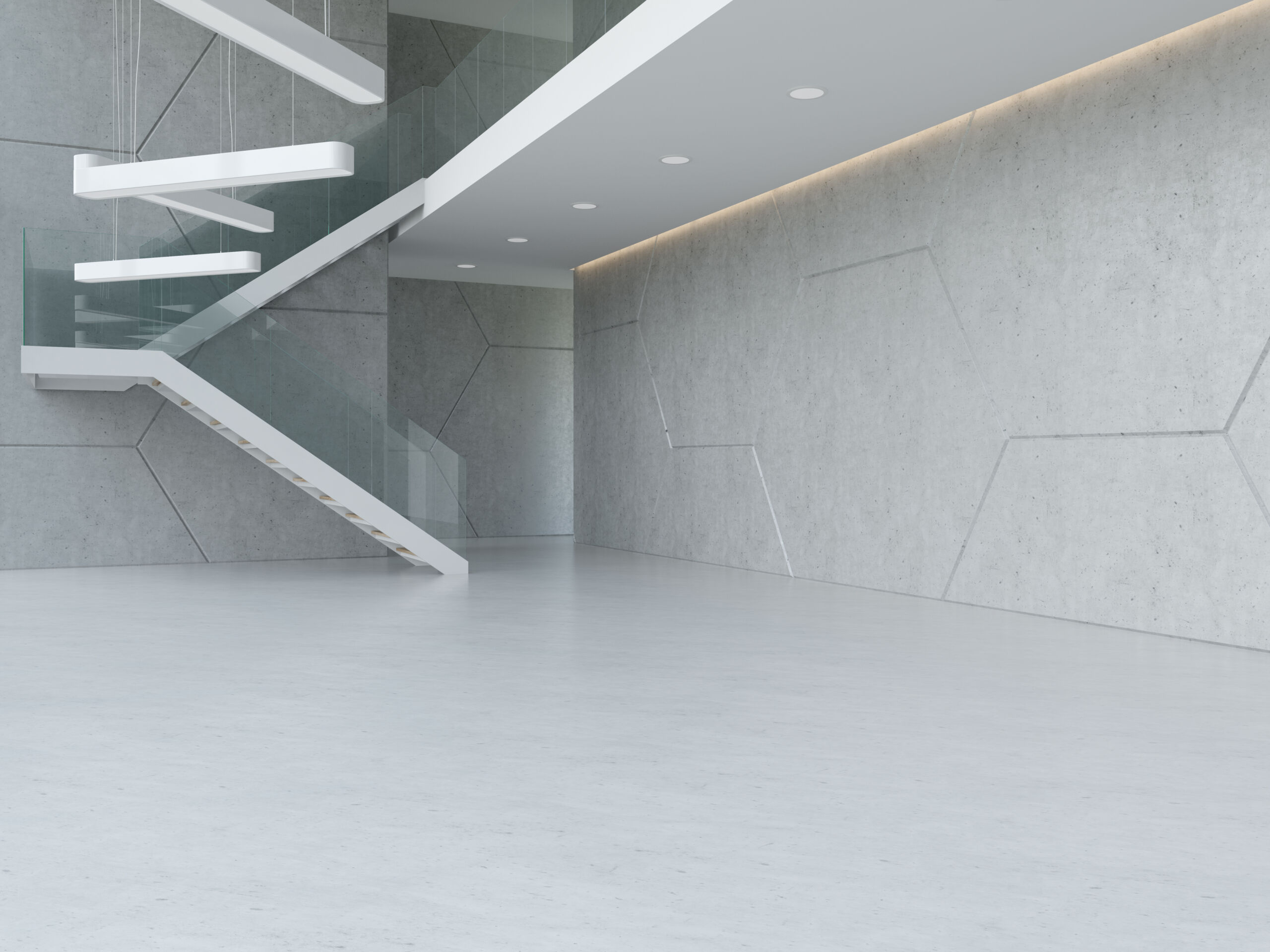 Seamless soft white Aero-Elastic Eco ergonomic resin flooring in a minimalist modern commercial office with floor-to-ceiling windows and contemporary furniture.