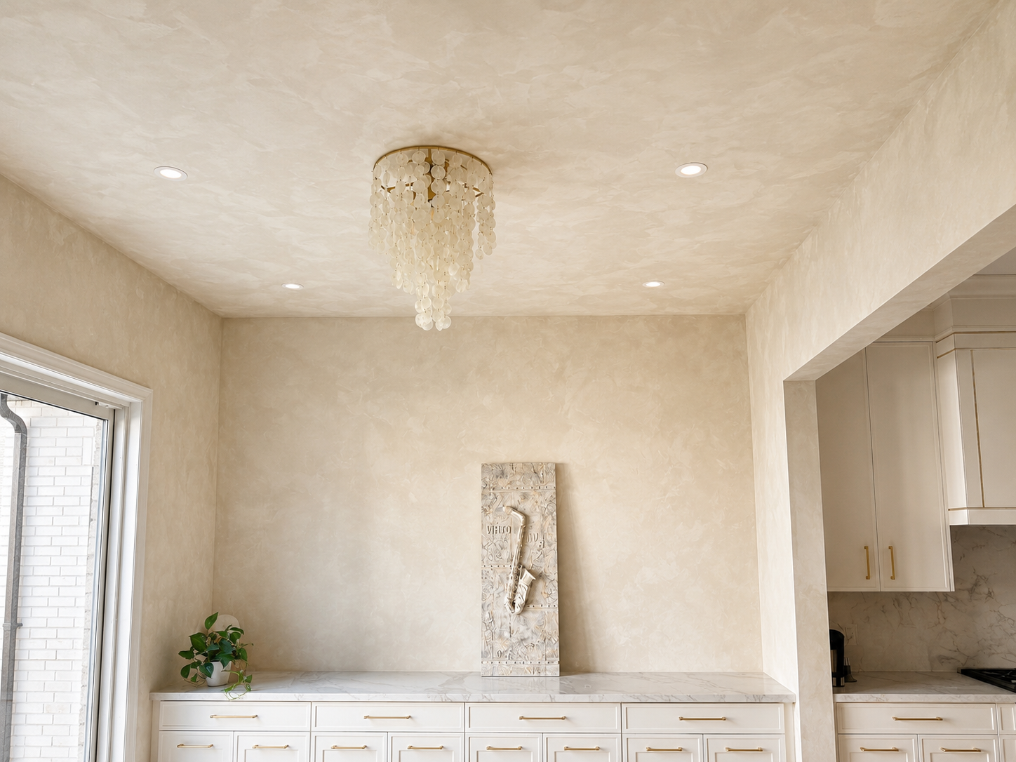 limewash-drench-walls-ceilings-kitchen-nook-prince-edward-county Soft warm limewash walls and ceiling in a bright kitchen nook by limewash painter Prince Edward County