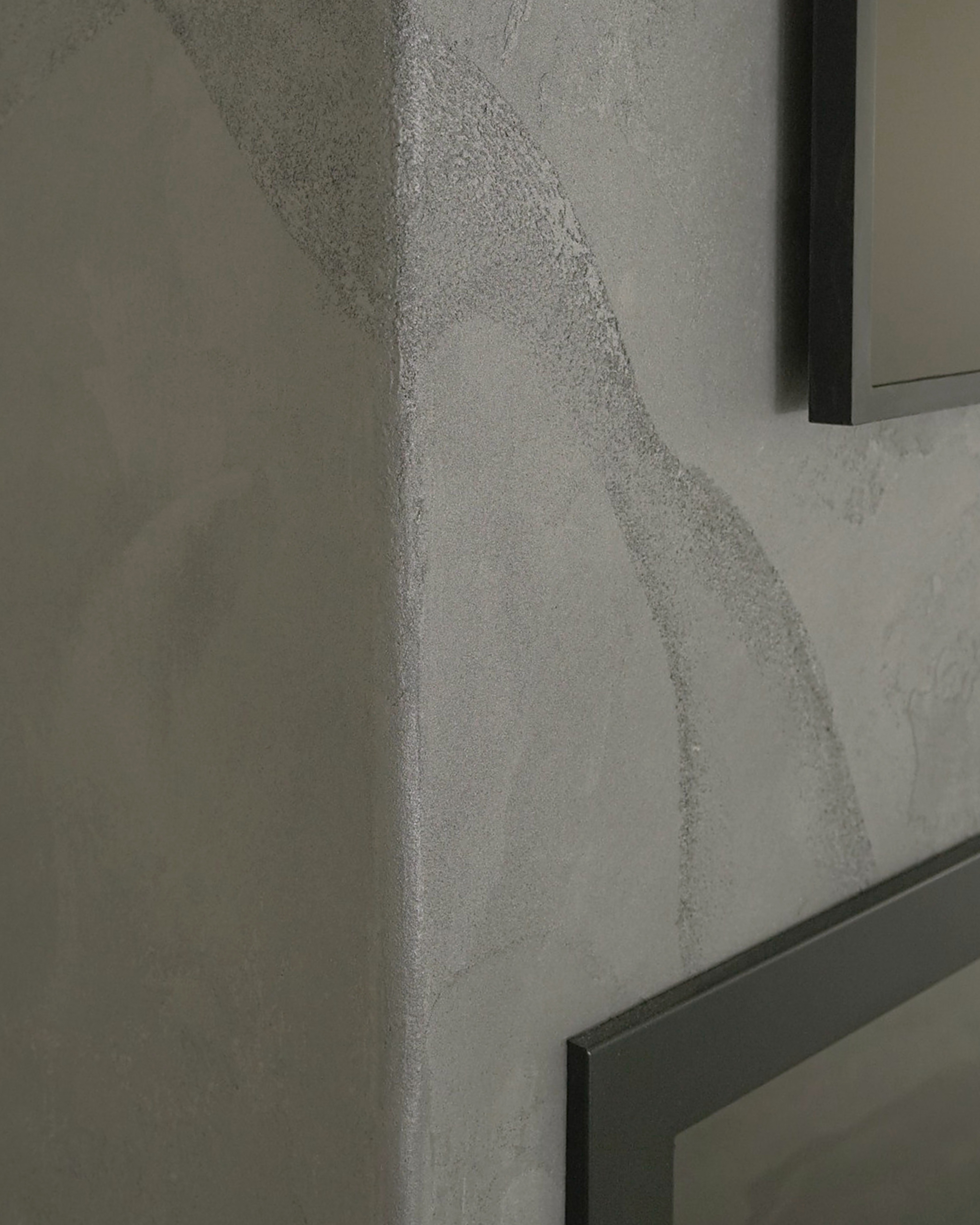 pearlescent-venetian-plaster-range-hood-european-farmhouse-kitchen-kleinburg-toronto Close-up of grey-navy pearlescent decorative plaster finish on a fireplace in a Kleinburg home