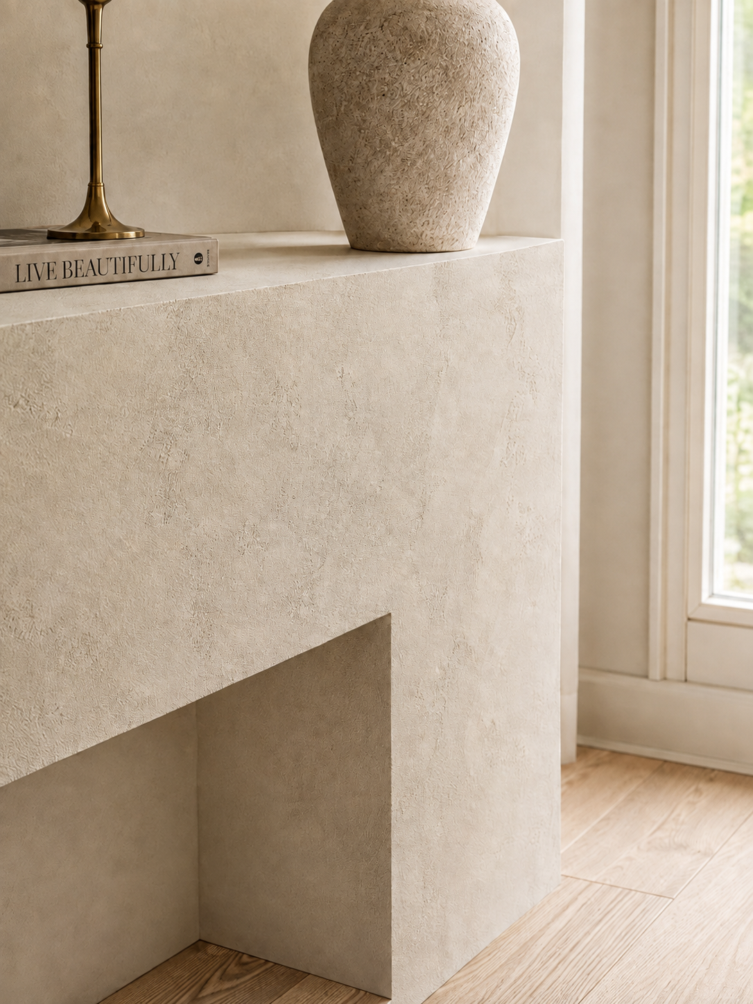 venetian-plaster-fireplace-world-map-design-master-bedroom1 Close-up of earthy Venetian plaster on fireplace combined with a creamy white natural decor
